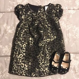 Black/gold leopard print dress and kitty shoes.